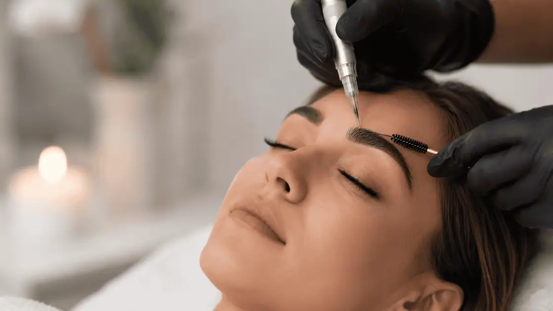 SMP laser hair removal treatment being performed to fade scalp micropigmentation while preserving existing hair follicles.